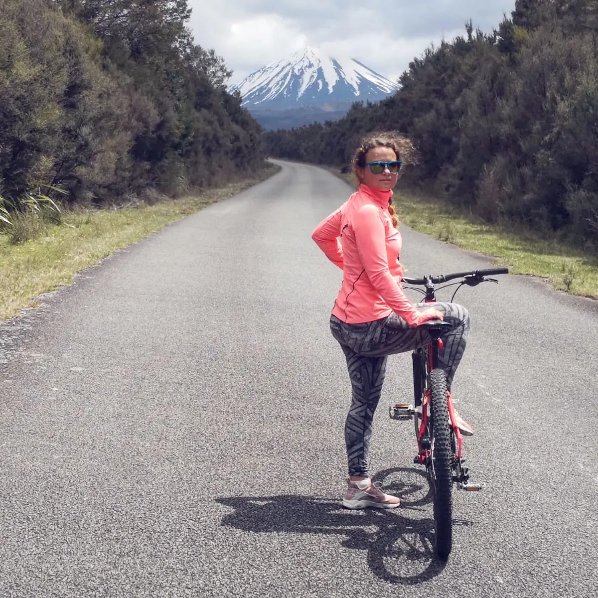 Anastasia Alex, founder, on a bike trail below Mt Taranaki